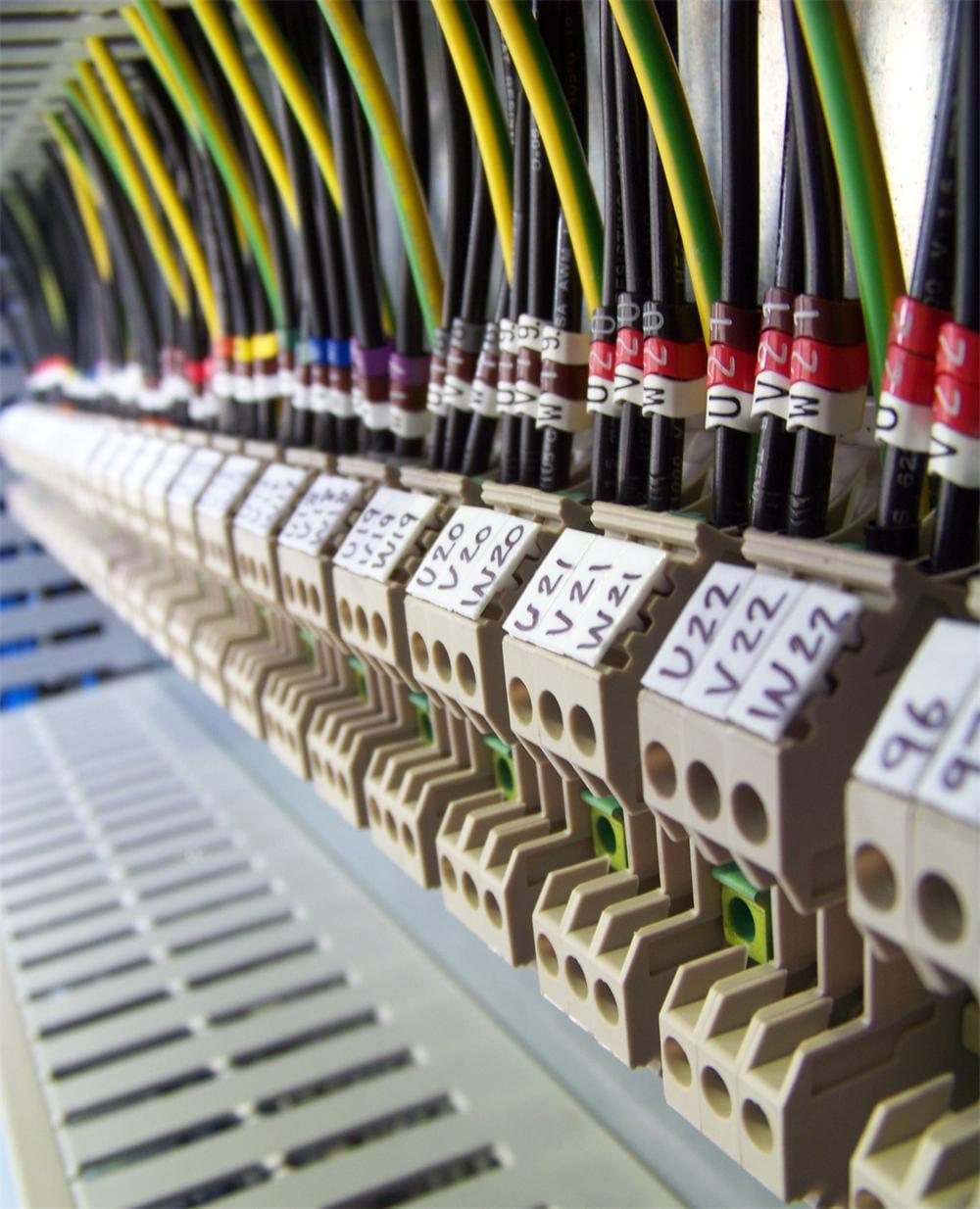 A close view of a terminal rail with numbered ferrules on every core