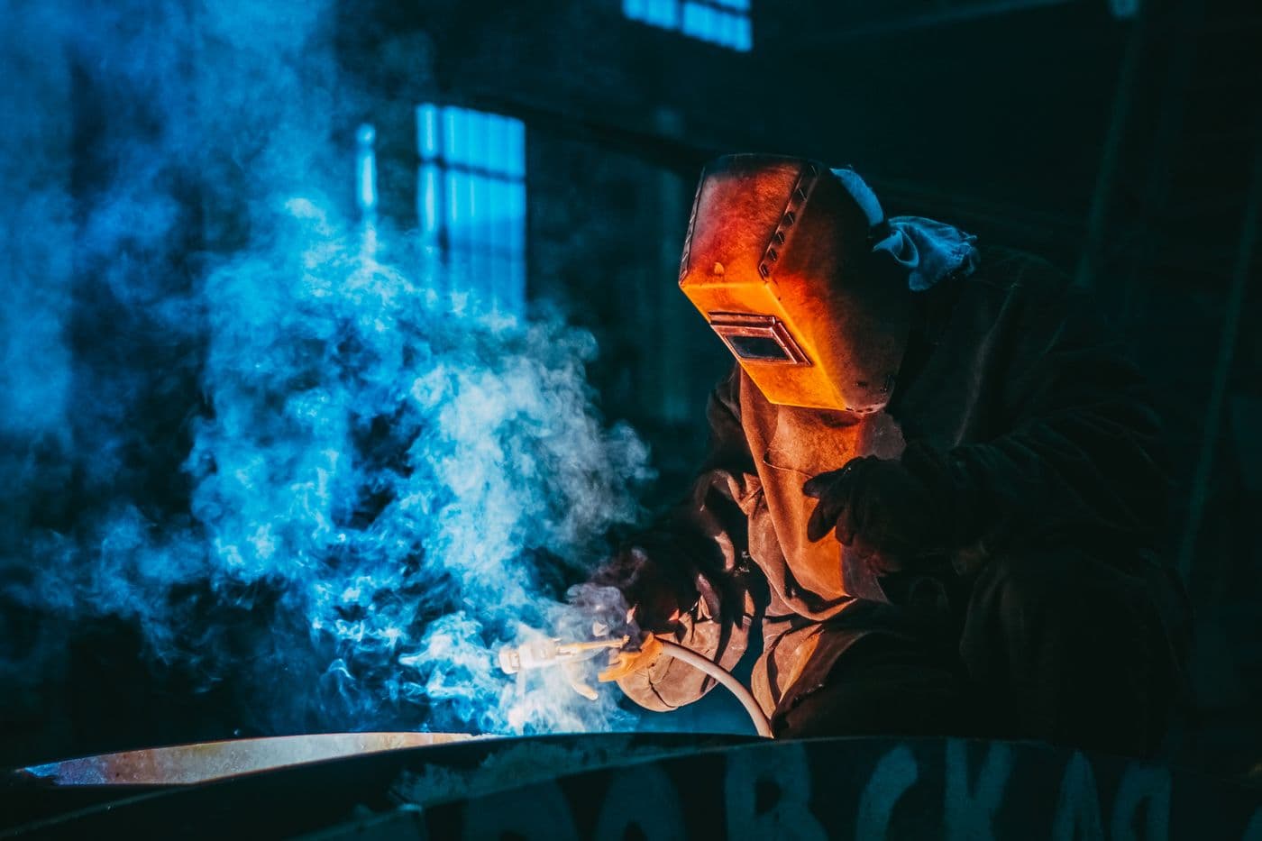Hot work being carried out under protective equipment