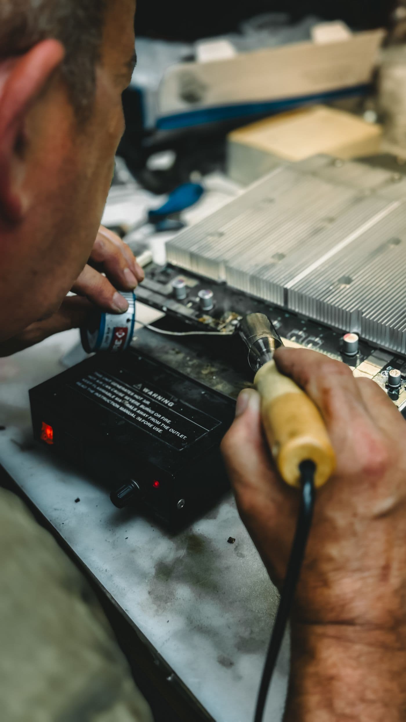 A technician servicing plant equipment